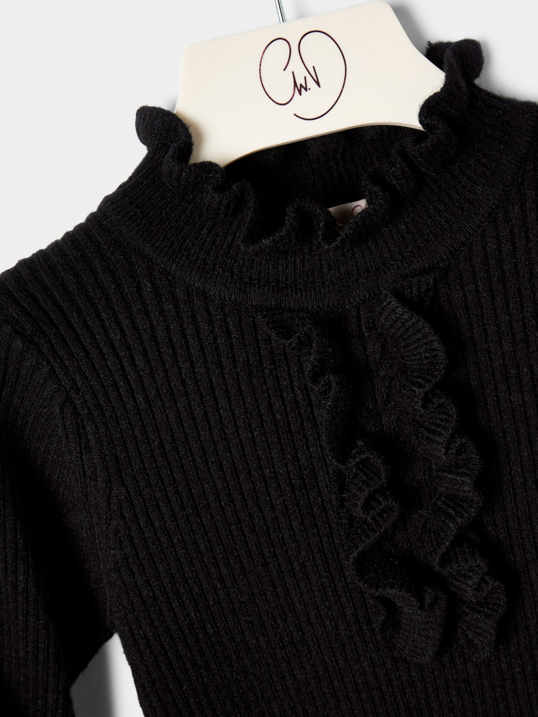 Girls Greta Knitted Top Ruffle Front Rib Jumper Available in Black and Cream