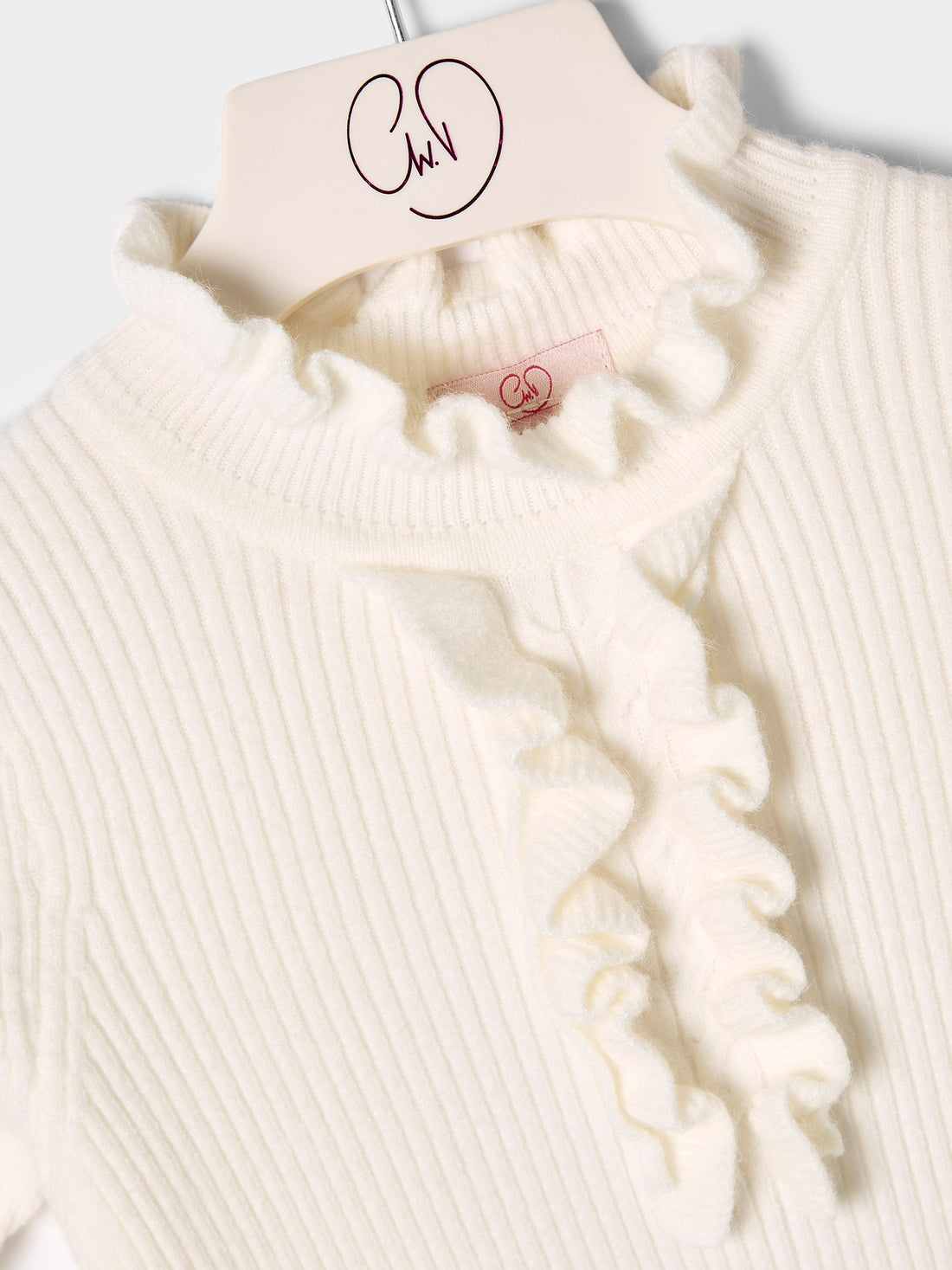 Girls Greta Knitted Top Ruffle Front Rib Jumper Available in Black and Cream