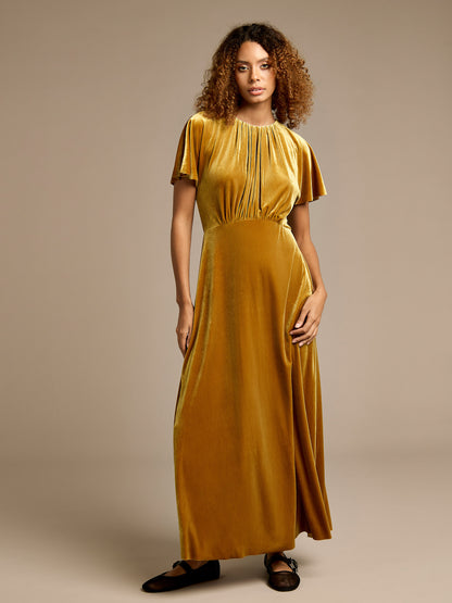 Hallie Gold Velvet Maxi Dress with Black Bow Detail